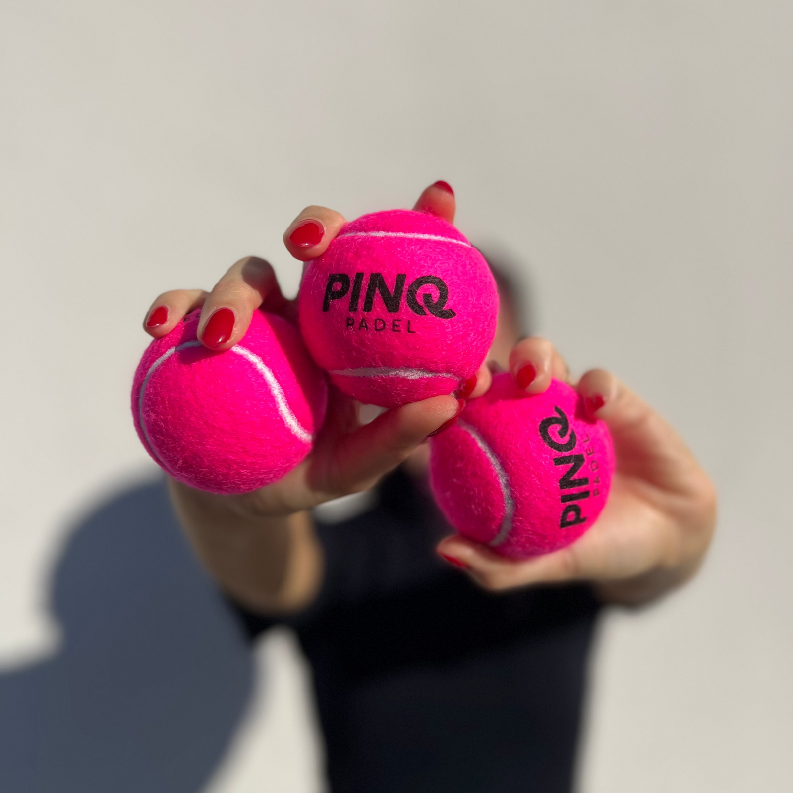 PINQ padelio kamuoliukai rožiniai – 1 vnt., 3 kamuoliukai, naudojimo metu